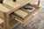 Rencott - Light Brown - Coffee Table (T781-1) by Ashley