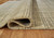 Janston - Ivory/Gray/Tan - 8' x 10' Rug (R406861) by Ashley