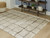 Wrenlow - Cream/Brown - 8' x 10' Rug (R407211) by Ashley