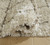 Wrenlow - Cream/Brown - 8' x 10' Rug (R407211) by Ashley