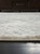 Precia - Gray/Cream - 5'3" x 7'3" Rug (R404132) by Ashley