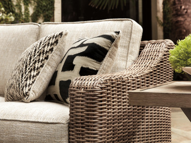 Beachcroft - Beige - 2-Piece Outdoor Loveseat with Cushion (P791-854) by Ashley