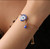 Wearing Evil Eye Bracelet