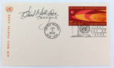 1966 UNITED NATIONS AIR MAIL POSTAL CARD FDC signed by DESIGNER of 11c STAMP.