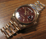 Vintage Rolex Day Date 1803 18K Rose Gold with Stella Ox Blood Dial Wrist Watch