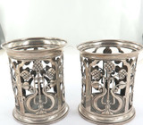 A PAIR 1903 ENGLISH STERLING SILVER JAMES DEAKIN HOLDERS