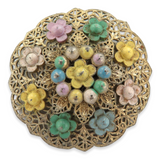 VINTAGE LARGE FLORAL THEME CONVEX SHAPED COSTUME BROOCH.