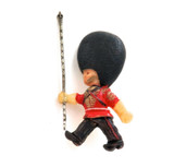 DELIGHTFUL VINTAGE LARGE CELLULOID PLASTIC BUCKINGHAM PALACE QUEENS GUARD BROOCH