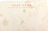 c1905 Postcard. Group of Zulu Men, Women and Children in Kraal