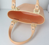 Vintage Salvatore Ferragamo plastic polyurethane bucket bag in pastel orange