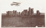 cWW1 Biplane Flying Over Stonehenge, UK Unused Postcard.