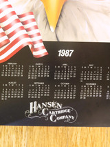 Hansen Cartridge Company 1987 Calendar Poster with eagle and American flag.