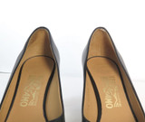 Salvatore Ferragamo Black and Gold-toned 'Tamina' Heels w original box. Size 7