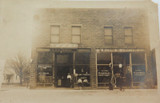 c1908 USA RPPC Postcard. Unknown City ? L D Clemmons, Grocer & Kings Hardware