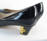 Pair of Classic Chanel Patent Leather Black & Gold-Tone CC Heel Pumps, size 38.5