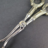 Pair of Vintage German Stainless Steel Tongs With Ornate Sterling Silver Handles