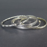Four Assorted Large Vintage Silver Bangles