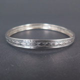 Four Assorted Large Vintage Silver Bangles