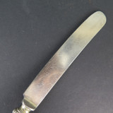 An Antique Dinner Knife with Hollowed Sterling Silver Handle