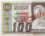 RARE Madagascar Specimen Note. 100F. Stamped, Punched, Overstamped. A1000000