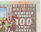 RARE Madagascar Specimen Note. 100F. Stamped, Punched, Overstamped. A1000000