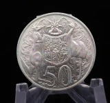 Graded UNC Downie's 1966 50c Round Coin 80% Silver AF929 (Light Rainbow Toning)