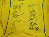 RUGBY UNION. WALLABIES SIGNED OFFICIAL KooGa SUPPORTERS SHIRT. 12 SIGNATURES.