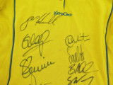 RUGBY UNION. WALLABIES SIGNED OFFICIAL KooGa SUPPORTERS SHIRT. 12 SIGNATURES.