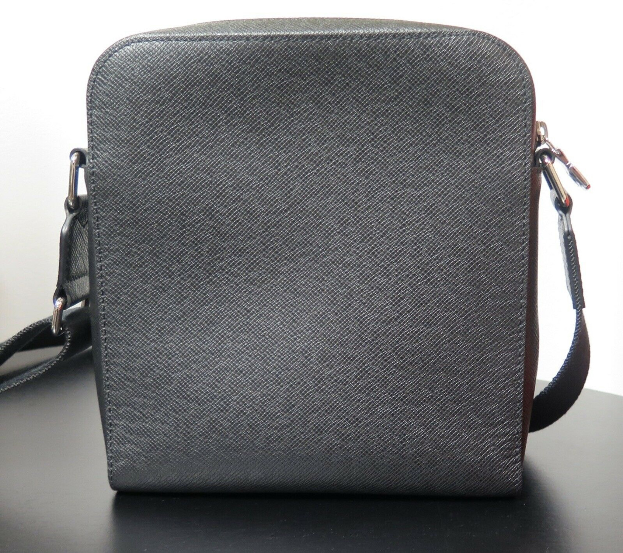 Louis Vuitton Nikolai Duffle Bag Grey Taiga Leather - Harrington & Co.