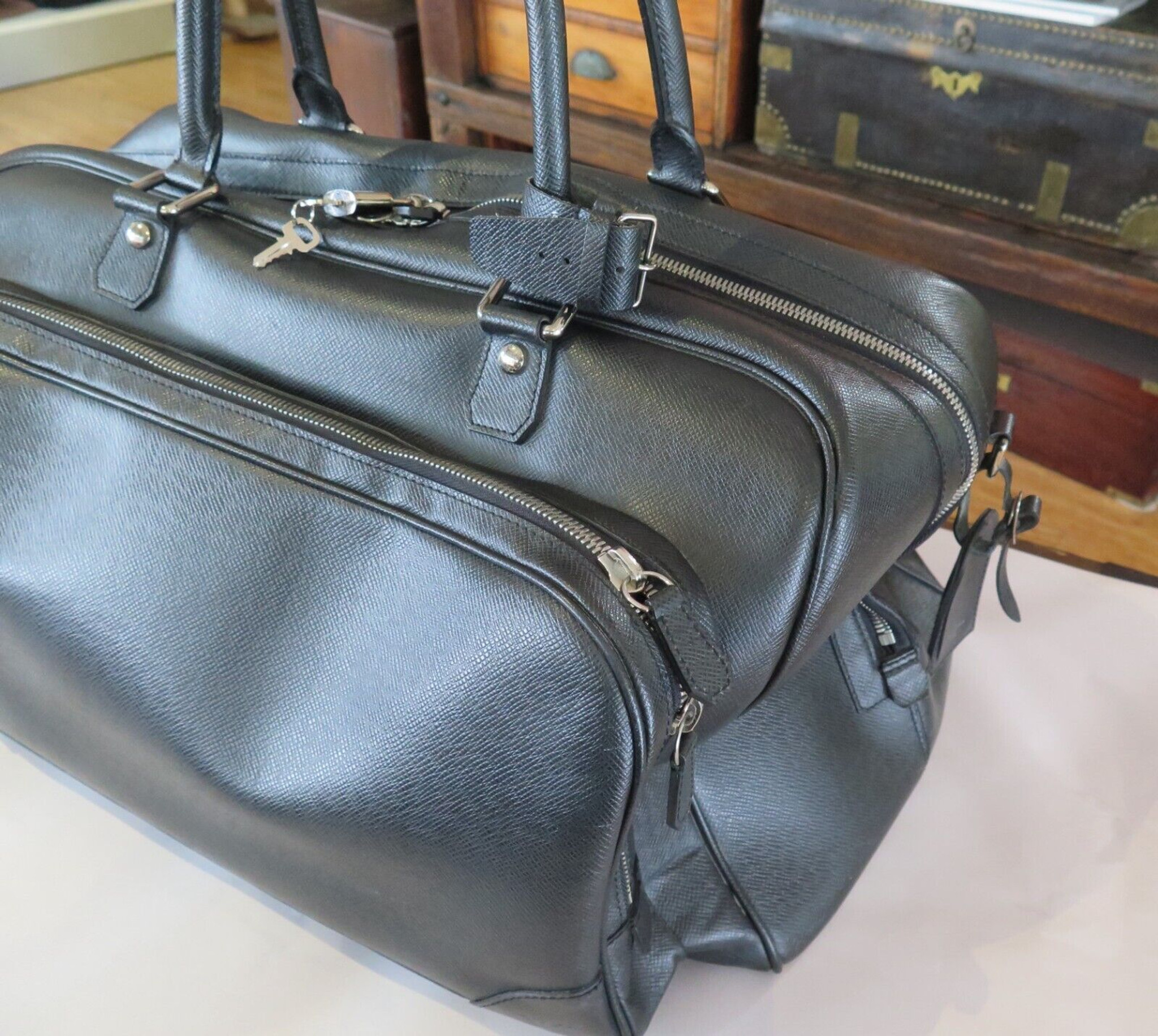 Louis Vuitton - Nikolai Ardoise Duffle/Travel Bag (Taiga Leather) – Every  Watch Has a Story