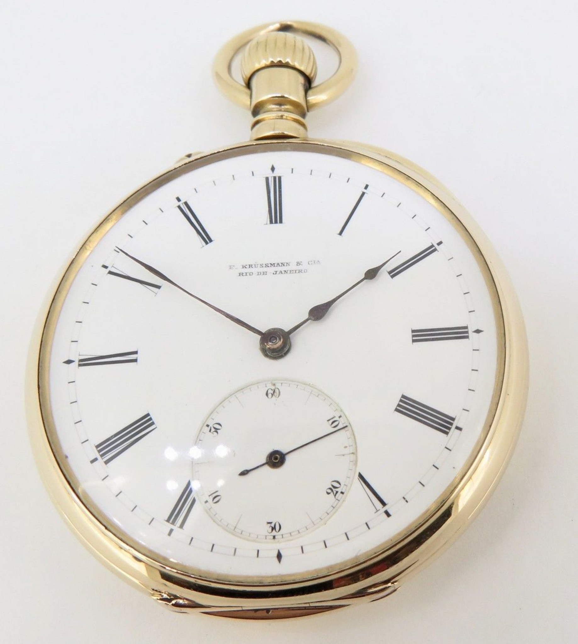 black and gold pocket watch