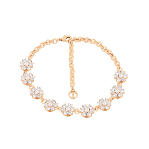 Gold daisy bracelet featuring multiple crystal-studded flower motifs linked together with an adjustable chain and clasp. Gold daisy bracelet featuring multiple crystal-studded flower motifs linked together with an adjustable chain and clasp.