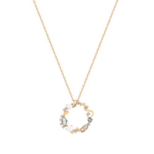 Gold Maureen O’Hara eclectic pendant necklace featuring a circular design with mixed crystals and pearl accents on an adjustable chain.