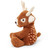 A soft, plush toy shaped like a deer. The deer is sitting in a three-quarter profile, looking to the left, with visible white spots on its brown body.