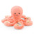 A soft, plush toy shaped like a salmon-colored octopus. The octopus is facing forward with a rounded head, a stitched smile, and two dark eyes. Its eight tentacles are curled outwards.