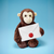 A plush brown monkey with a cream-colored face and ears, holding a white envelope with a red wax seal.