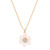 Gold pendant necklace with a daisy design, featuring pink pearl petals and a sparkling crystal-studded center on an adjustable chain.