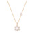 Gold daisy pendant necklace with crystal-studded petals and pearl center on a delicate chain.