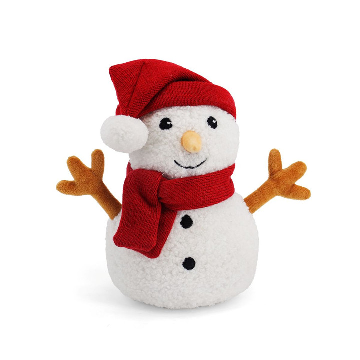 A soft, plush toy shaped like a snowman. The snowman has a textured white body, black button-like eyes, a stitched smile, and a tan, conical nose. Its arms are brown and twig-like. It is wearing a red knit hat with a white pom-pom and a matching red knit scarf. The toy is standing upright against a white background.