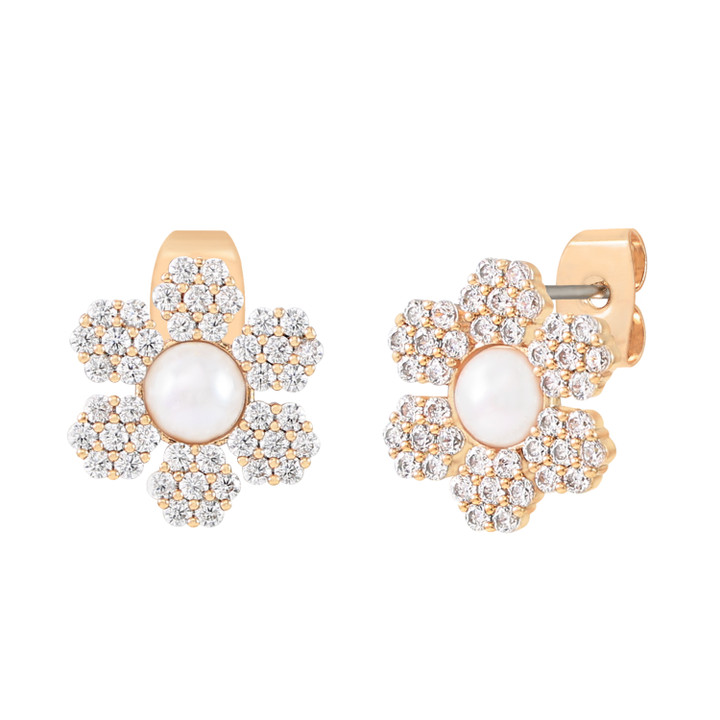 Gold daisy stud earrings with sparkling crystal-encrusted petals and a pearl center.