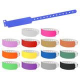 A collection of event wristbands in various colours, featuring a blue wristband with holes for adjustable sizing and a logo.
