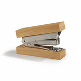 A bamboo stapler with a silver metal mechanism, featuring a sleek, natural wood finish.