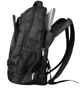 A black backpack featuring multiple zippered compartments and mesh pockets, with a laptop partially visible inside.