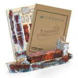 A wooden model of a cargo ship in rusted reds and browns, accompanied by assembly instructions and a branded logo.