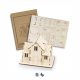 A wooden model house kit in natural colour, featuring cut-out pieces and assembly instructions. Includes a branded package.