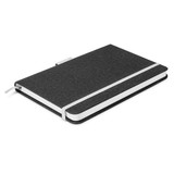A two-tone black notebook with a white ribbon closure and a textured cover, featuring a logo on the front. A two-tone black notebook with a white ribbon closure and a textured cover, featuring a logo on the front.