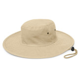 A wide-brimmed hat in a light beige colour, featuring a chin strap and side vents. It has a branded logo. A wide-brimmed hat in a light beige colour, featuring a chin strap and side vents. It has a branded logo.