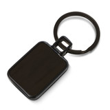 A black key ring with a rectangular tag shape and a circular attachment. It features a branding logo. A black key ring with a rectangular tag shape and a circular attachment. It features a branding logo.