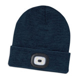 A dark blue beanie with a built-in headlamp at the front. The beanie features a logo. A dark blue beanie with a built-in headlamp at the front. The beanie features a logo.