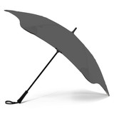 A black BLUNT Classic Umbrella with a sleek design and a sturdy black handle. Features a logo on the fabric.